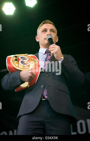 Belfast, Ireland. 9th Sept, 2014 Boxer Carl Frampton with his IBF world super-bantam weight belt which he won on Saturday 6th September 2014 after defeating Kiko Martinez Credit:  Bonzo/Alamy Live News Stock Photo