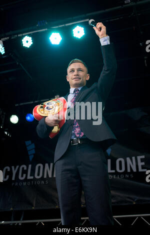 Belfast, Ireland. 9th Sept, 2014 Boxer Carl Frampton with his IBF world super-bantam weight belt which he won on Saturday 6th September 2014 after defeating Kiko Martinez Credit:  Bonzo/Alamy Live News Stock Photo