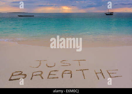 Just breathe sign in Nungwi north of Zanzibar island.Tanzania. Stock Photo