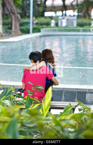 Two Friends Together In Victoria Park, Hong Kong. Stock Photo