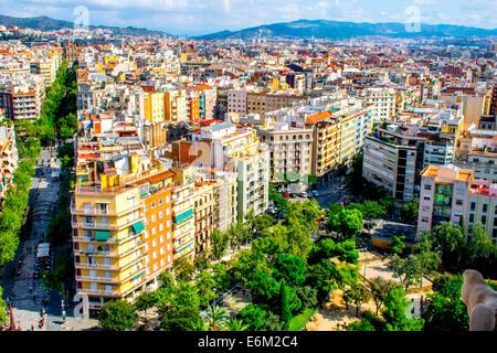 View from the Nativity Facade tower in Gaudi's masterpiece, the Sagrada Familia, looking over Barcelona in Spain Stock Photo