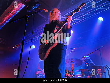 American indie rock band, Warpaint performing live on stage at the Liverpool O2 Academy  Featuring: Emily Kokal Where: Liverpool, United Kingdom When: 20 Feb 2014 Stock Photo