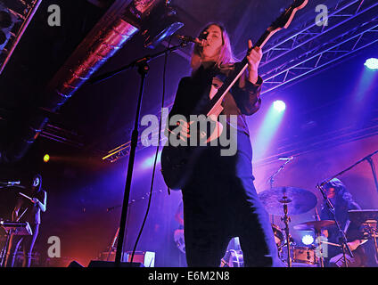 American indie rock band, Warpaint performing live on stage at the Liverpool O2 Academy  Featuring: Emily Kokal Where: Liverpool, United Kingdom When: 20 Feb 2014 Stock Photo