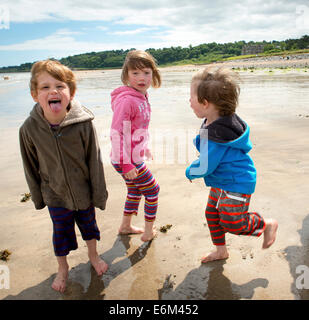 Co. Down Kids Playing on Crawfordsburn Beach Northern Ireland. Stock Photo