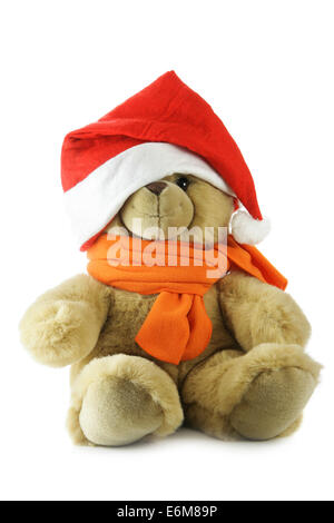 Teddy bear with Santa hat isolated over a white background Stock Photo