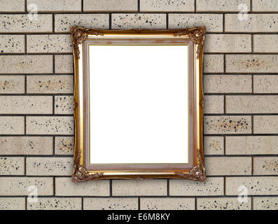 blank golden frame on brick stone wall background Stock Photo