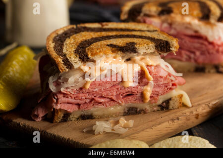 Homemade Reuben Sandwich with Corned Beef and Sauerkraut Stock Photo