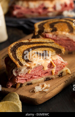 Homemade Reuben Sandwich with Corned Beef and Sauerkraut Stock Photo