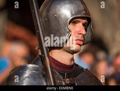 A portrait of a man in historical costume, knights in armour with helmets, Palio di Siena, Siena, Tuscany, Italy Stock Photo