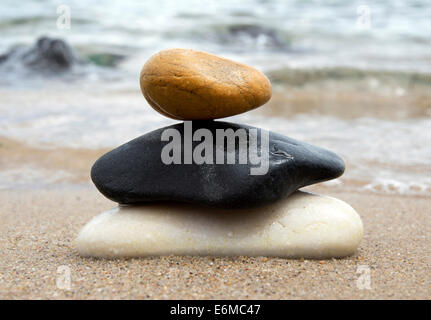 A tower of stones by the sea Stock Photo