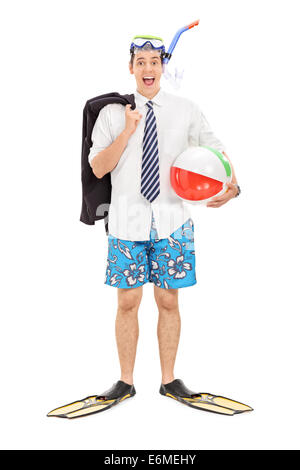 Full length portrait of a businessman with diving mask and a beach ball Stock Photo
