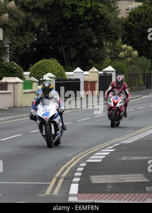 Guy Martin and Ian Hutchinson entering Ramsey , during the Isle of Man TT 2014 Stock Photo