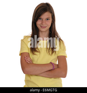 Young teenager girl portrait with folded arms, isolated on a white background Stock Photo