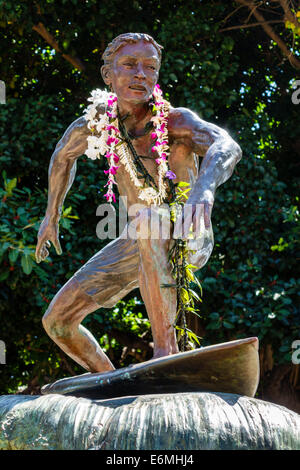 Honolulu Waikiki Beach Hawaii,Hawaiian,Oahu,Sans Souci State Recreational Park,statue,bronze,Surfer on a Wave,sculptor Robert Pashby,public art,lei,US Stock Photo