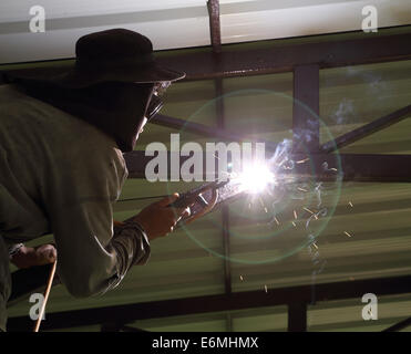 worker us electric welding connecting construction metal Stock Photo