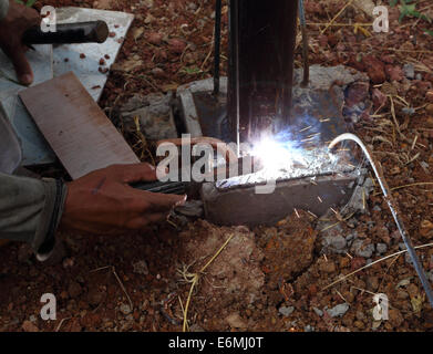 worker us electric welding connecting construction metal Stock Photo