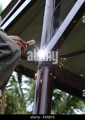 worker us electric welding connecting construction metal Stock Photo