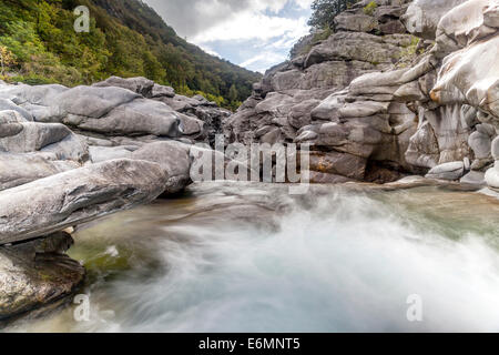 Granite rock formations in the Maggia river in the Maggia Valley, Valle Maggia, Ponte Brolla, Canton of Ticino, Switzerland Stock Photo