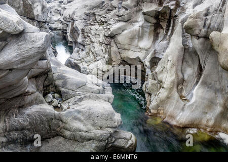 Granite rock formations in the Maggia river in the Maggia Valley, Valle Maggia, Ponte Brolla, Canton of Ticino, Switzerland Stock Photo