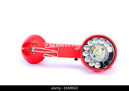 An old telephon with rotary dial,Telephone line tester (lineman test set) Stock Photo