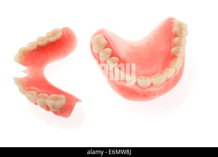 Dentures on a gray background Stock Photo
