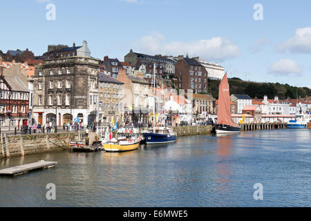 Whitby harbour with an old sailing boat - north Yorkshire, England Stock Photo