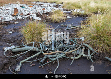 Copper and Brass Wreckage Collected together Ready to be Taken From a WW2 Air Crash Site, Dufton Fell, Pennines Cumbria UK Stock Photo