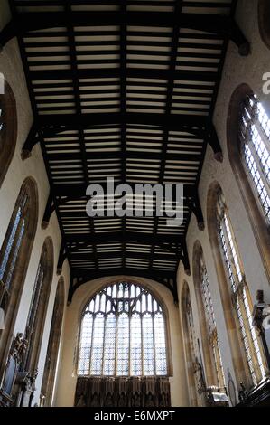 Inside view of the University church of St Mary showing the ceiling detail and stained glass window, Oxford, Oxfordshire, UK. Stock Photo