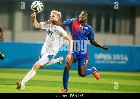 Nanjing, China. 27th Aug, 2014.Helgi Gudjonsson(L) of Iceland competes in the men's bronze medal match of football during Nanjing 2014 Youth Olympic Games in Nanjing, capital of east China's Jiangsu Province, on Aug. 27, 2014. Team Iceland won team Cape Verde. Credit:  Xinhua/Alamy Live News Stock Photo