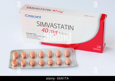 Crescent Pharma Limited Simvastatin 40 mg tablets in a foil blister pack with box for prescribed treating and reducing high cholesterol. England UK