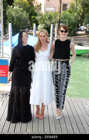 Venice, Italy. 27th Aug, 2014. British actress/cast member Andrea Riseborough (L-R) and US actresses/cast members Amy Ryan and Emma Stone pose at a photocall for 'Birdman or (The Unexpected Virtue of Ignorance)' during the 71st annual Venice International Film Festival, in Venice, Italy, 27 August 2014. Presented in the official competition Venezia 71, the movie opens the festival that runs from 27 August to 06 September. Photo: Hubert Boesl/dpa/Alamy Live News