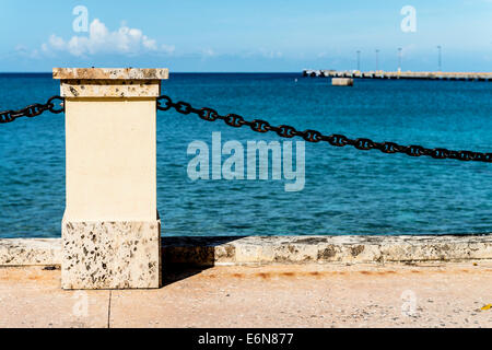 A waterfront area showing the Caribbean sea and Frederiksted pier in St. Croix, U. S. Virgin Islands. USVI, U.S.V.I. Stock Photo