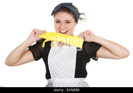 Young beautiful hispanic maid wearing apron and gloves Stock Photo