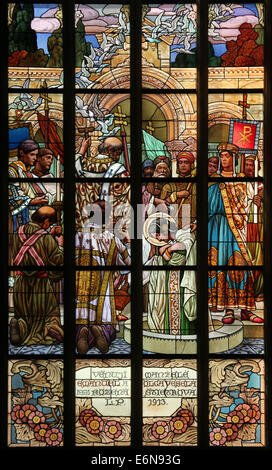 Baptism of Saint Olga of Kiev in Constantinople. Stained glass window in Saint Barbara's Church in Kutna Hora, Czech Republic. Stock Photo