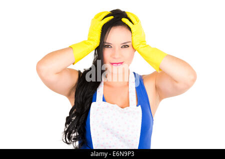 Beautiful young girl wearing apron and gloves cleaning Stock Photo