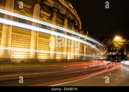 The Bank of Ireland building, Dame Street, Dublin with light streaks from passing traffic Stock Photo