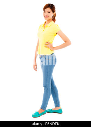 pretty young girl standing .isolated on white background Stock Photo