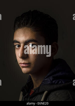 Reyhanli, Turkey. 15th Dec, 2013. Moataz, age 18, from Idlib, is a Syrian refugee boy at a the Free Syria school. © David Gross/ZUMA Wire/Alamy Live News Stock Photo