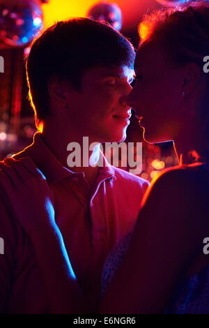 Amorous couple spending leisure in the night club Stock Photo