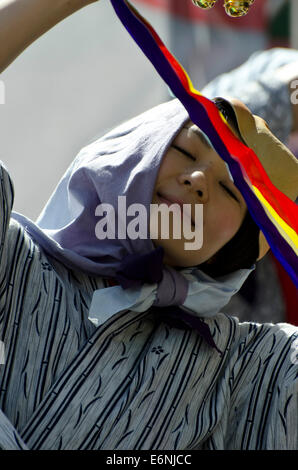 Japanese dancer in a strange costume promoting a show at the annual Festival Fringe in Edinburgh, Scotland. Stock Photo