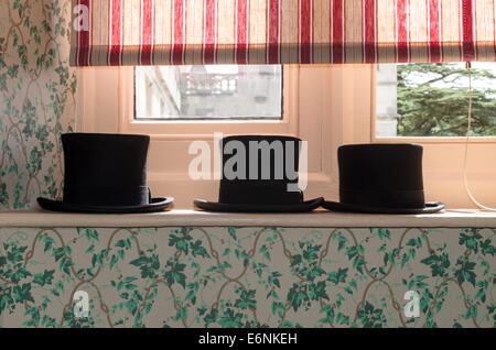 Top hats in a row Stock Photo