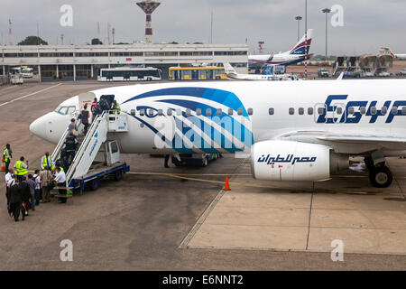 Passengers and aeroplane at Kotoka International Airport, Accra, Ghana, Africa Stock Photo