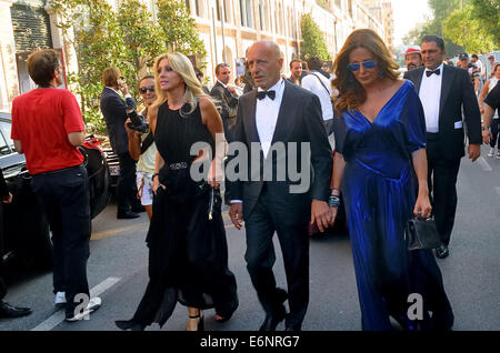 Venice, Italy. 27th August, 2014. Venice Lido. 71st Venice International Film Festival. The red carpet. Alessandro Sallusti, director of the newspaper Libero and his wife Daniela Santanché (right). Credit:  Ferdinando Piezzi/Alamy Live News Stock Photo