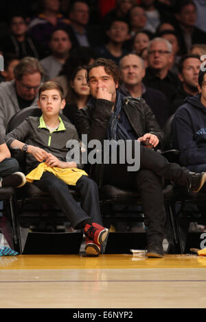 Celebrities courtside at the Lakers game. The Los Angeles Lakers defeated the Boston Celtics by the score of 101-92 at Staples Center  Featuring: Johnny Galecki Where: Los Angeles, California, United States When: 21 Feb 2014 Stock Photo