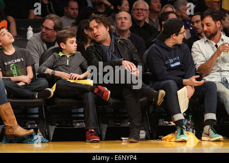 Celebrities courtside at the Lakers game. The Los Angeles Lakers defeated the Boston Celtics by the score of 101-92 at Staples Center  Featuring: Johnny Galecki Where: Los Angeles, California, United States When: 21 Feb 2014 Stock Photo