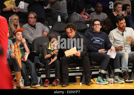 Celebrities courtside at the Lakers game. The Los Angeles Lakers defeated the Boston Celtics by the score of 101-92 at Staples Center  Featuring: Johnny Galecki Where: Los Angeles, California, United States When: 21 Feb 2014 Stock Photo