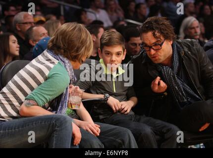 Celebrities courtside at the Lakers game. The Los Angeles Lakers defeated the Boston Celtics by the score of 101-92 at Staples Center  Featuring: Johnny Galecki Where: Los Angeles, California, United States When: 21 Feb 2014 Stock Photo