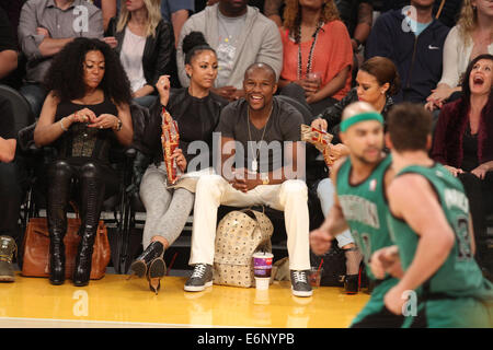 Celebrities courtside at the Lakers game. The Los Angeles Lakers