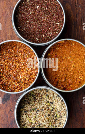 Spice in round bowls: merquen, Za'atar, Ras el hanout, dukkah Stock Photo