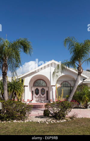 Front of Middle Class Florida Suburban Home with Palm Trees, FL, USA Stock Photo